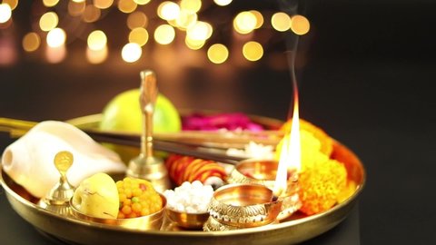 Rotating Golden Pooja Ki Thali Decorated With Mithai, Diya, Deep, Flowers, Genda Phool, Shankh, Roli, Kumkum, Agarbatti, Ghanti, Raksha, Moli. Theme For Navratri, Dussehra Puja, Karva Chauth, Teej