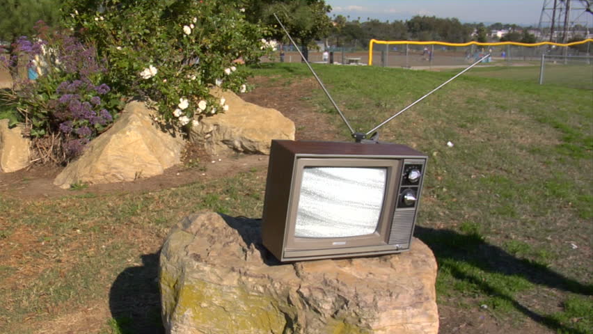 retro tv on a Rock in the park