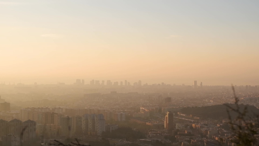 City polution. Smoke sky. Cars polution. Climate change. Global warming. Polution over Barcelona. Royalty-Free Stock Footage #1081045859