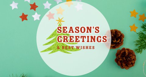 Animation of seasons greetings and best wishes christmas text over green background. christmas, tradition and celebration concept digitally generated video.