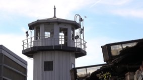Prison watchtower seen from a distance. - Powered by Shutterstock - Get 15% off with code: PIKWIZARD15