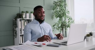 African American businessman using laptop for video conference