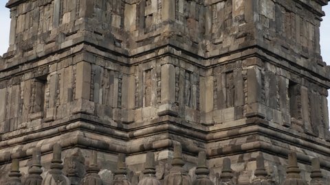 Hindu temple Prambanan in Yogyakarta, Indonesia. Prambanan Temple an ancient architecture, stupas, statues, carved stone walls. UNESCO Hinduism Complex close to Yogyakarta. 4K video.