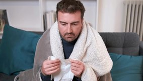 Video about one man feeling cold at home after home heating trouble