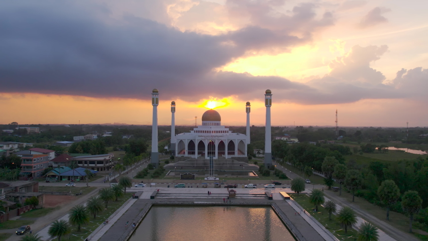 Mosque Aerial view flying Beautiful grand Masjid Ramadan evening colorful sunrise India. best 4K. Landscape drone camera clouds sunset or sunrise golden sky . | Shutterstock HD Video #1081070999