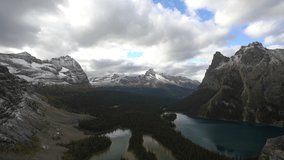 Lonely Female Sitting on Rock at Viewpoint Above Lake O'Hara. Stunning Landscape of Yoho National Park, British Columbia, Canada - Powered by Shutterstock - Get 15% off with code: PIKWIZARD15