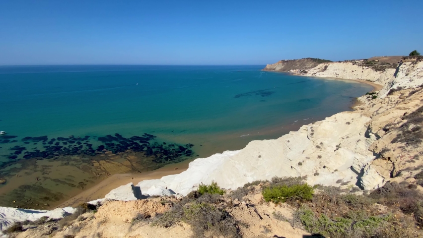 Scala dei Turchi in Realmonte near Agrigento in Sicily. Very white rock, made up of Marl, it has an undulating and irregular shape with soft and rounded lines.