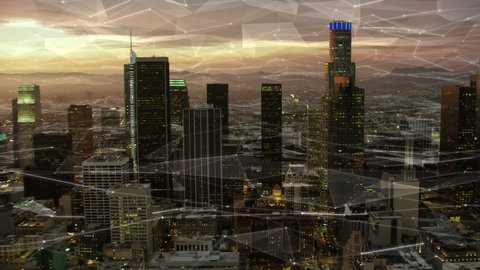 Connected Aerial View of The Financial District In Downtown Los Angeles at Sunset. Famous Skyscrapers With Futuristic Network. Internet Of Things, Smart Cities, Big Data, Augmented Reality. California