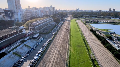 Drone view of horses racing at the Hipodromo Argentino de Palermo, Buenos Aires