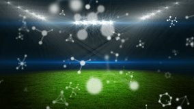 Animation of molecules rotating over stadium. global science, sports and digital interface concept digitally generated video. - Powered by Shutterstock - Get 15% off with code: PIKWIZARD15