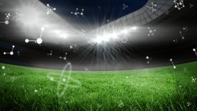 Animation of molecules rotating over stadium. global science, sports and digital interface concept digitally generated video. - Powered by Shutterstock - Get 15% off with code: PIKWIZARD15