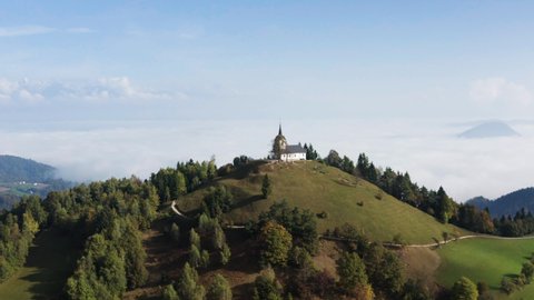 Scenic View Of St. Jacob Church On Hilltop In Brezovica pri Medvodah, Slovenia. Aerial