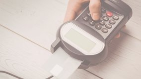 Animation of euro banknotes falling over hand of caucasian man holding payment terminal. finance, money, no cash payments safety digital generated video. - Powered by Shutterstock - Get 15% off with code: PIKWIZARD15