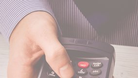 Animation of euro banknotes falling over hand of caucasian man holding payment terminal. finance, money, no cash payments safety digital generated video. - Powered by Shutterstock - Get 15% off with code: PIKWIZARD15