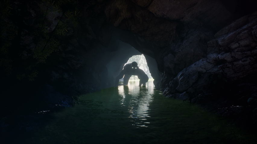 A horrible, toothy creature makes its way through a cave in the green jungle. A concept of a green jungle populated by monsters. The animation is perfect for horror, sci-fi or apocalyptic backgrounds. | Shutterstock HD Video #1081142942