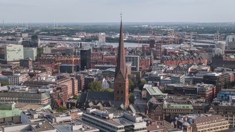 Hamburg, Germany - circa 2021: Establishing Aerial View Shot of Hamburg De, Mecklenburg-Western Pomerania, Germany, St. James' Church, day 