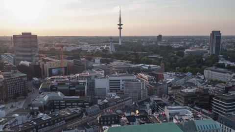 Hamburg, Germany - circa 2021: Establishing Aerial View Shot of Hamburg De, Mecklenburg-Western Pomerania, Germany, late afternoon, TV Tower Hamburg