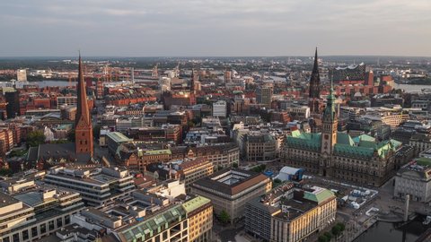 Establishing Aerial View Shot of Hamburg De, Mecklenburg-Western Pomerania, Germany, sunset, golden hour, rathaus and old town
