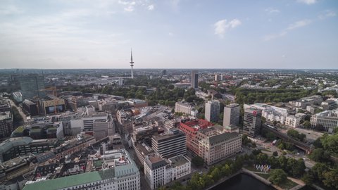 Hamburg, Germany - circa 2021: Establishing Aerial View Shot of Hamburg De, Mecklenburg-Western Pomerania, Germany, day, super wide, skyline
