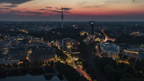 Hamburg, Germany - circa 2021: Establishing Aerial View Shot of Hamburg De, Mecklenburg-Western Pomerania, Germany, city falling asleep, Tv tower