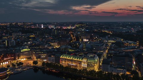Establishing Aerial View Shot of Hamburg De, Mecklenburg-Western Pomerania, Germany, magical late sunset, waterfront, old town, Biennenalster