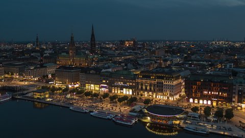 Establishing Aerial View Shot of Hamburg De, Mecklenburg-Western Pomerania, Germany, at night evening, wonderful old town