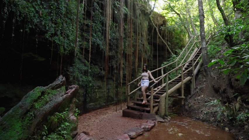 Tourist woman at Sussuapara Canyon in Jalapao Brazil
