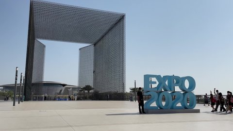 Dubai, United Arab Emirates - October 2021: Security waves at school group entering Dubai Expo 2020