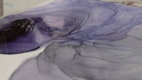 artist draws abstraction with ink. hair dryer blurs mascara creating an abstract drawing - Powered by Shutterstock - Get 15% off with code: PIKWIZARD15