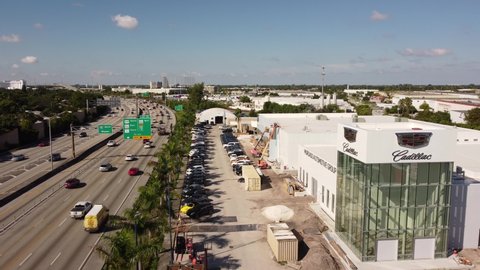 Miami, FL, USA - October 15, 2021: Aerial video Ocean Cadillac Murgado Automotive Group under construction