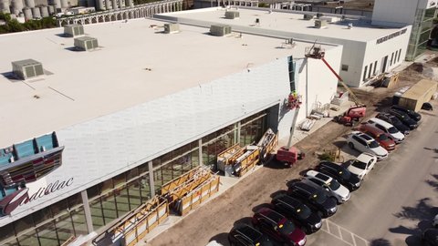 Miami, FL, USA - October 15, 2021: Aerial video Cadillac car dealership under construction Miami FL