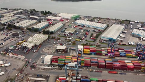 Aerial video of Container Crane working at Container Terminals Belfast Dockyard Northern Ireland 10-10-21
