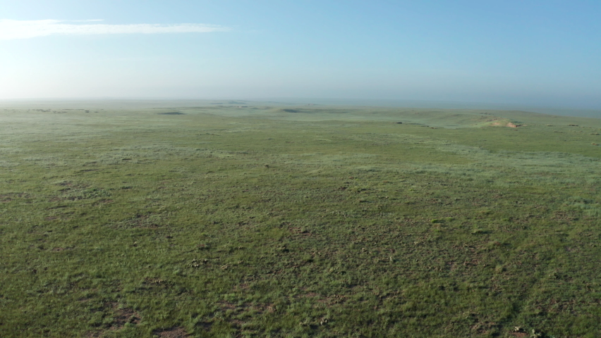 Drone Moving Flying Over North American Great Plains Prairie Grasslands in Summer