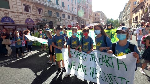 Rome, Italy, september 2021- young pupils  with masks demonstrate against climate change