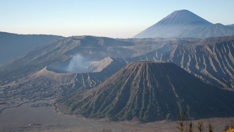 Mount Bromo, Mount Semeru, Batok active volcanoes in East Jawa, Indonesia. View of volcanoes Mount Gunung Bromo in Tengger Semeru National Park. 4K video. Wonderful Indonesia. King Kong viewpoint.