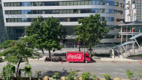 Bangkok, Thailand – October 25, 2021  : Coca Cola Truck Car Driving, Truck Transport Car on Road, Logistics Truck, Sathorn District, Bangkok
