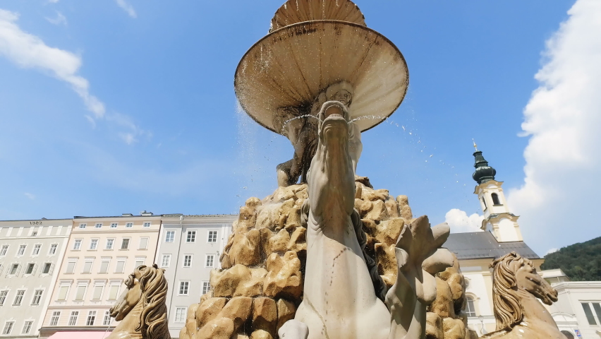 Fountain on Residenz square in the historic part of Salzburg, Austria