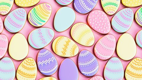 Delicious multicolour cookies in Easter eggs shapes. Cute pastel yellow, pink, violet and blue icing cakes. Traditional bright colour pastries while spring celebration. Happy Easter. Joy. Cheerful.
