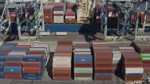Long Beach, California, USA - October 20th, 2021: Drone footage of hundreds of shipping containers on the grounds of Long Beach Port