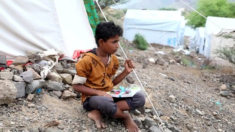 Taiz, Yemen- 08 Oct  2021 : A sad child in a camp for displaced people from the war in Yemen, Taiz
