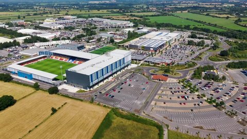 York UK, 21st July 2021: Aerial drone footage of the Vangarde Shopping Park in Huntington in the UK showing the shopping centre and the York Community Stadium Leisure Complex in the summer time