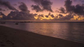 Night to Day time lapse video with beatiful sunrise over the ocean