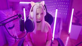 Angry gamer girl with cat ears headphones live streaming loosing a game 4K