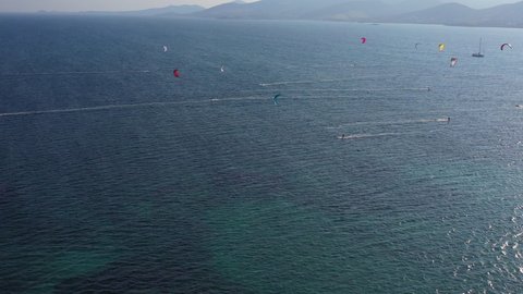 Panoramic view with kite surfers in  Punda beach in Paros island of Greece