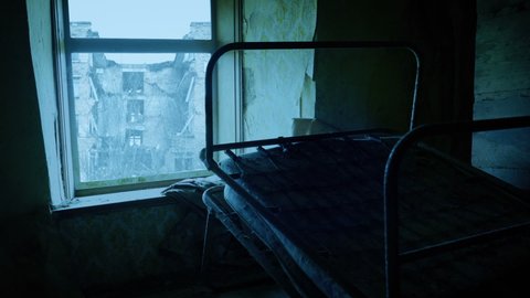 Bedroom In Bombed Out Urban Area In Snowfall