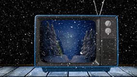 Animation of happy christmas text in tv over fairy lights and snow falling. christmas, tradition and celebration concept digitally generated video.