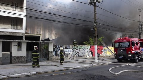 Sao Paulo , Sao Paulo , Brazil - 10 23 2021: Sao Paulo, Brazil, Oct 23, 2021: Firefighters suppress large urban fire