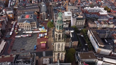 GRONINGEN, NETHERLANDS - 23. OCTOBER 2021: Hyperlapse of Martinitoren Martini Church Tower next to Grote Markt in the City Center 
