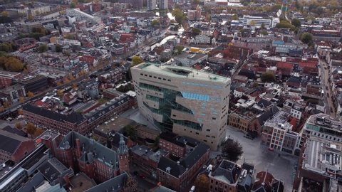 GRONINGEN, NETHERLANDS - 23. OCTOBER 2021: Orbiting shot of the Forum, a modern architectural building in the city center of Groningen