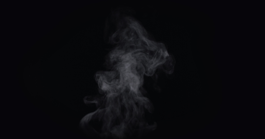 White natural rising steam from food or hot drink isolated on a black background. Сan be used in any projects with hot food. | Shutterstock HD Video #1081341557